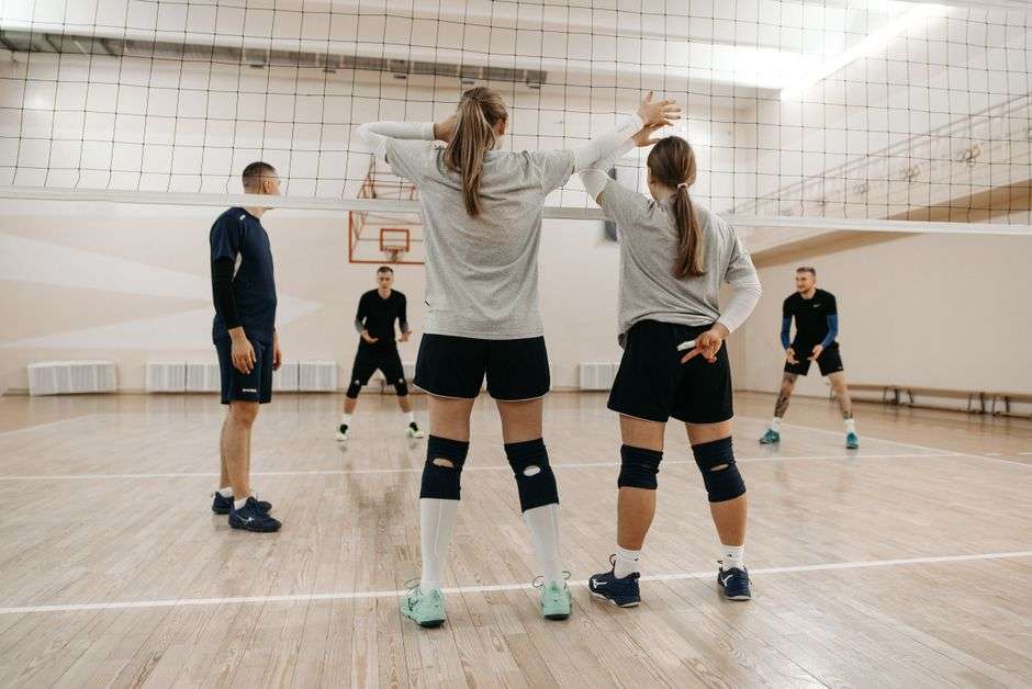 young volleyball players team encouragement practice